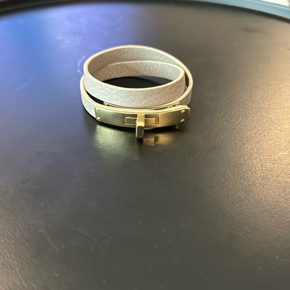 Francesca’s collection grey leather wrap bracelet with gold clasp